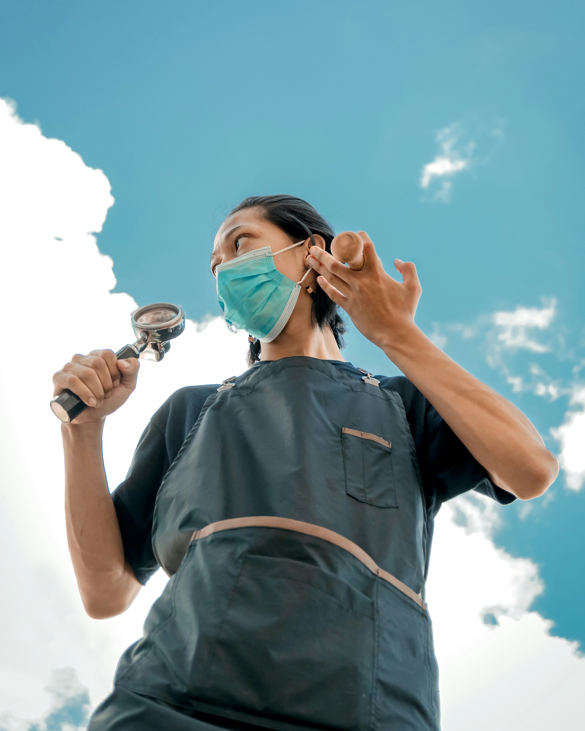 man in black button up shirt wearing goggles