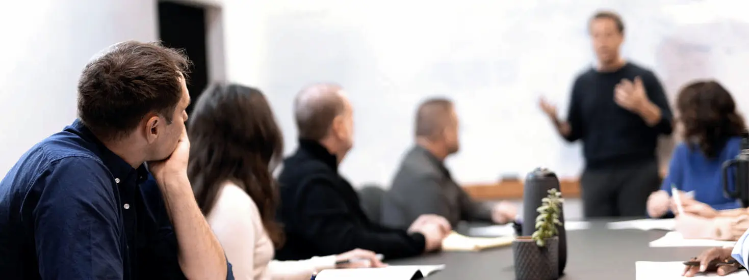 Sherpas guiding climbers up a mountain