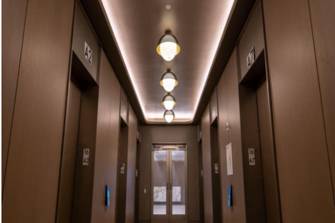 A shot of the hanging light fixtures in the hallway
