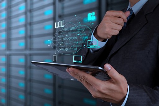 Business professional managing network connections on tablet, nDataStor managed IT services