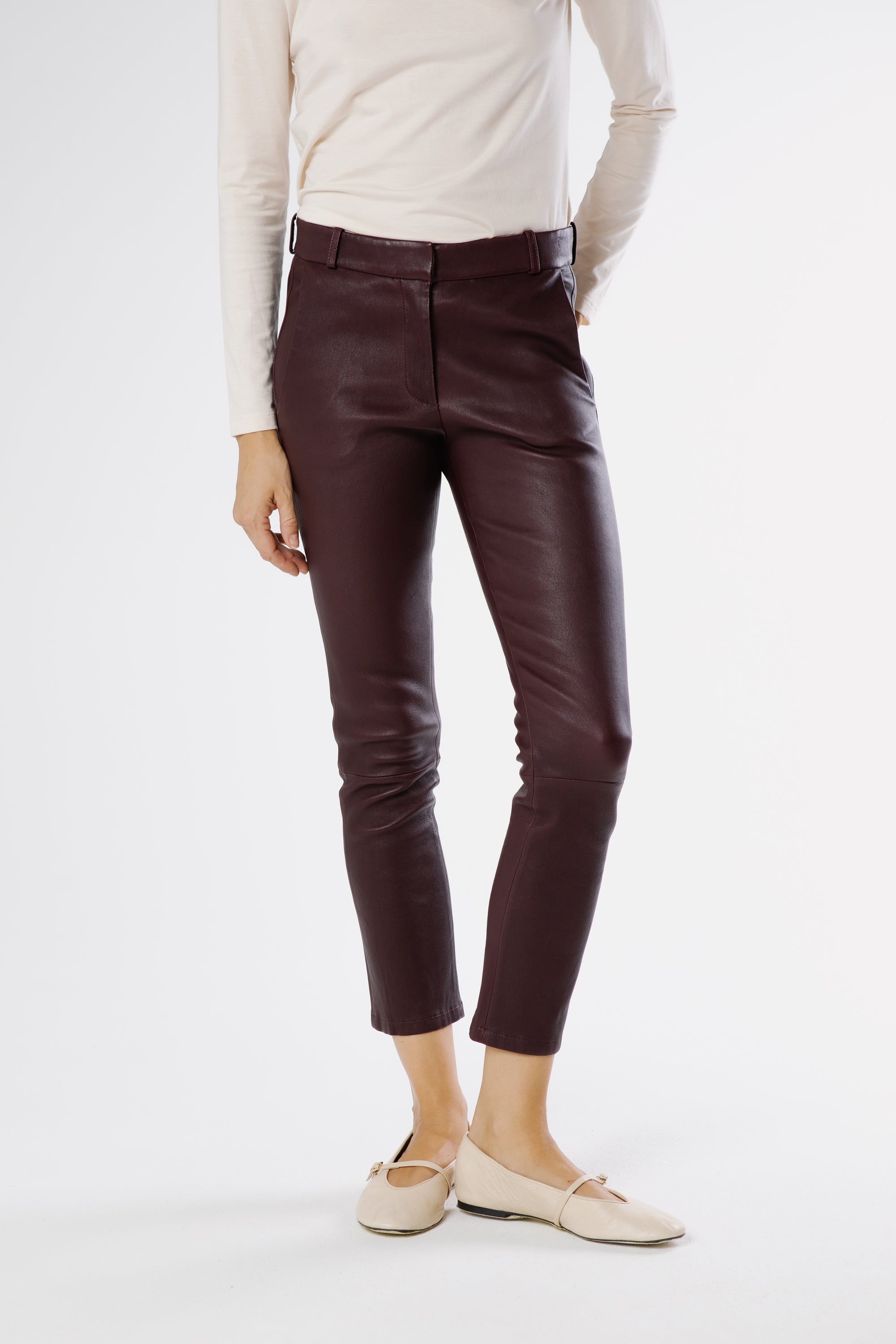 Close-up of Marina Na leather trousers in Shiraz showing waistband and fine leather finish