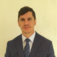 woman in black long sleeve shirt sitting on white couch