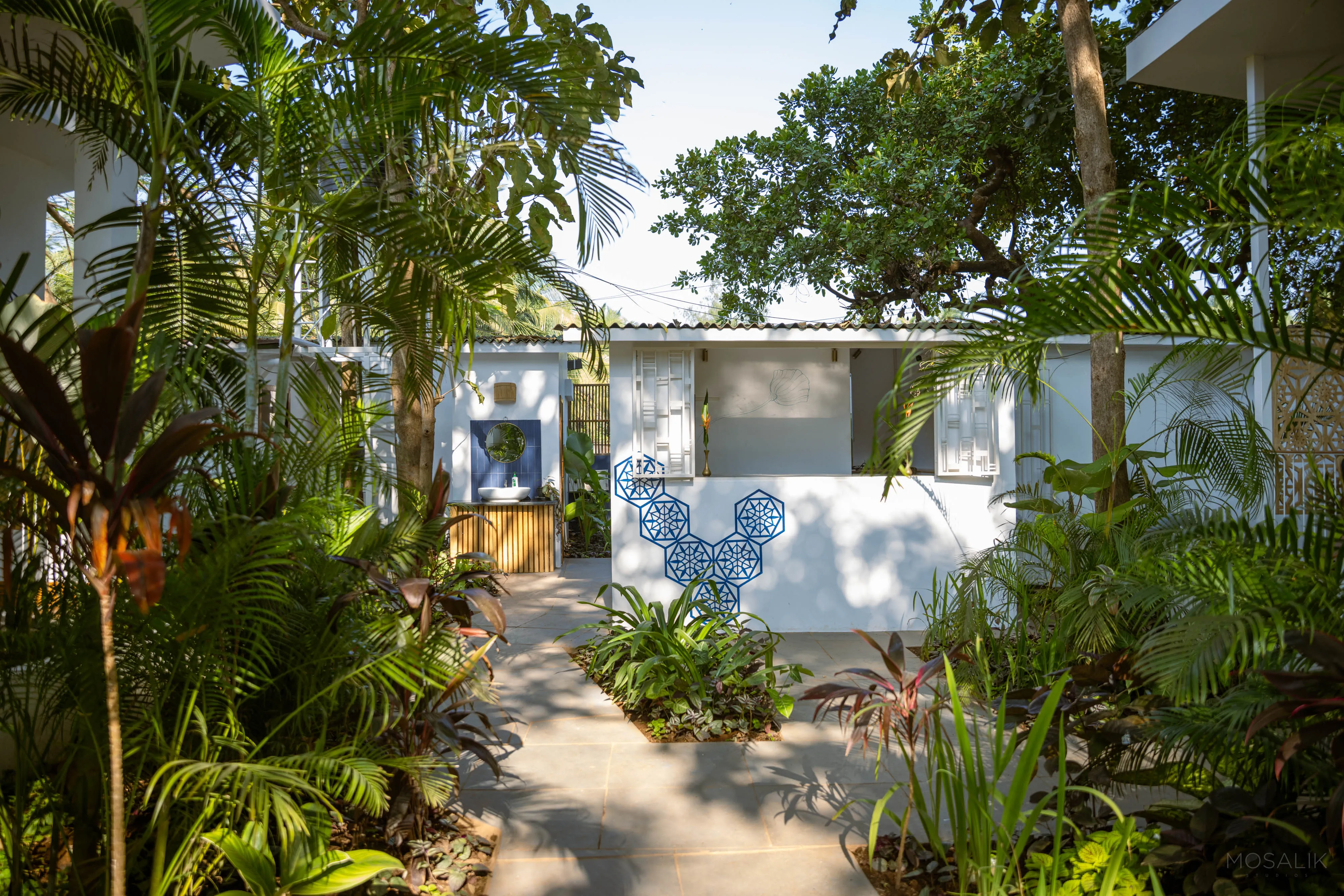 Path to the garden rooms at Jaali Blue