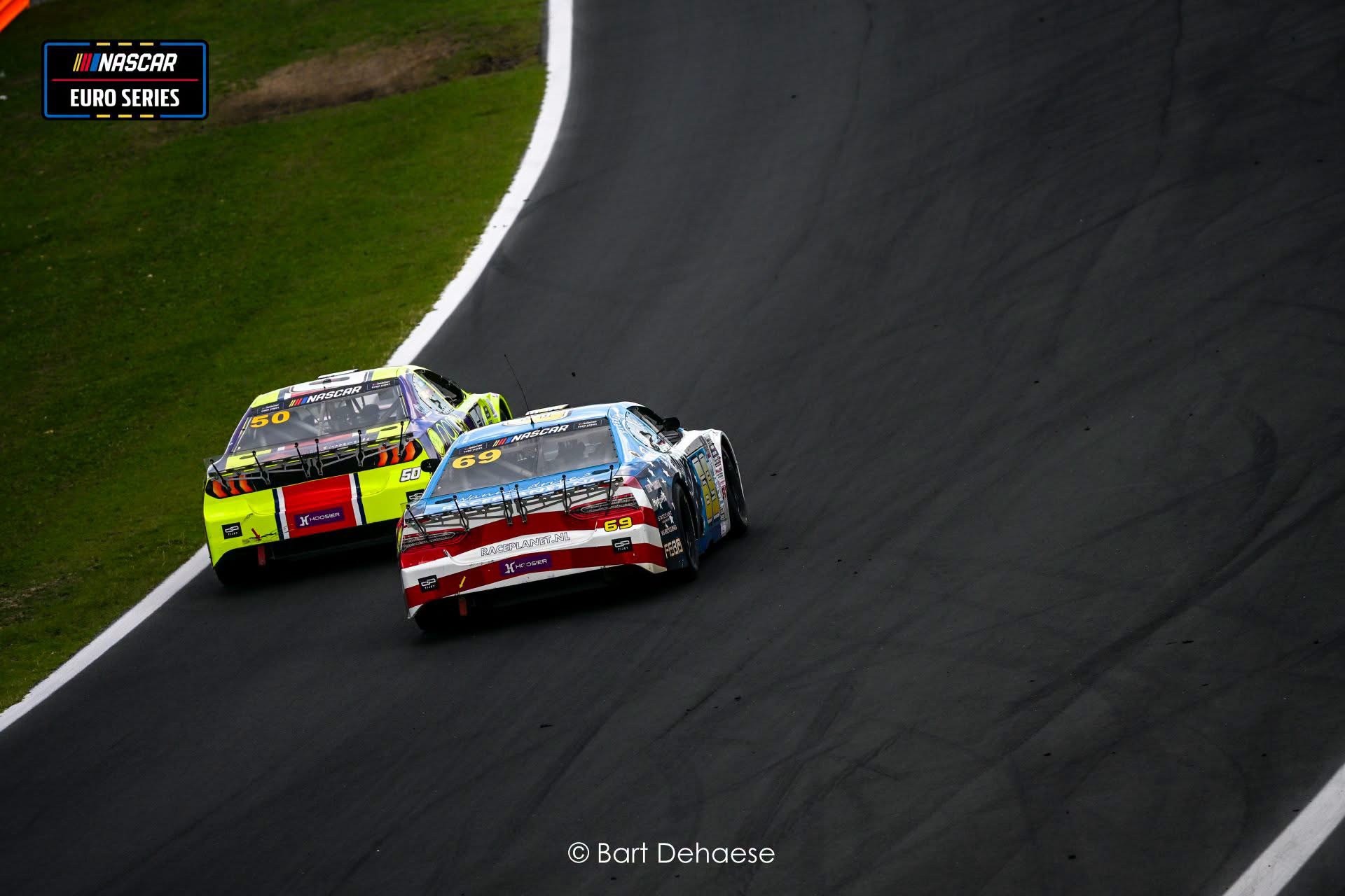 Ford Mustang Number 50 racing Number 69 at Vallelunga