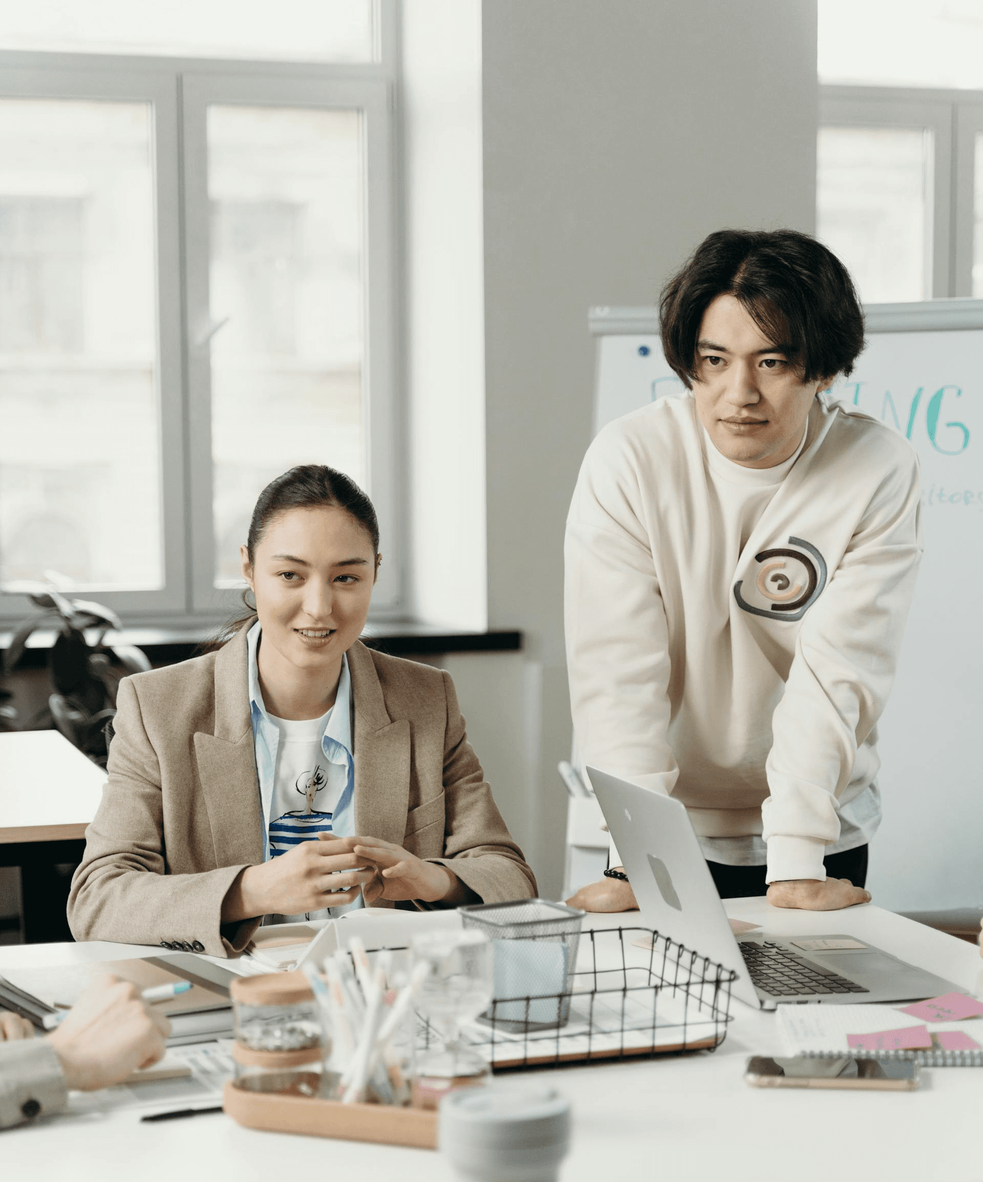 Individuals in an office listening