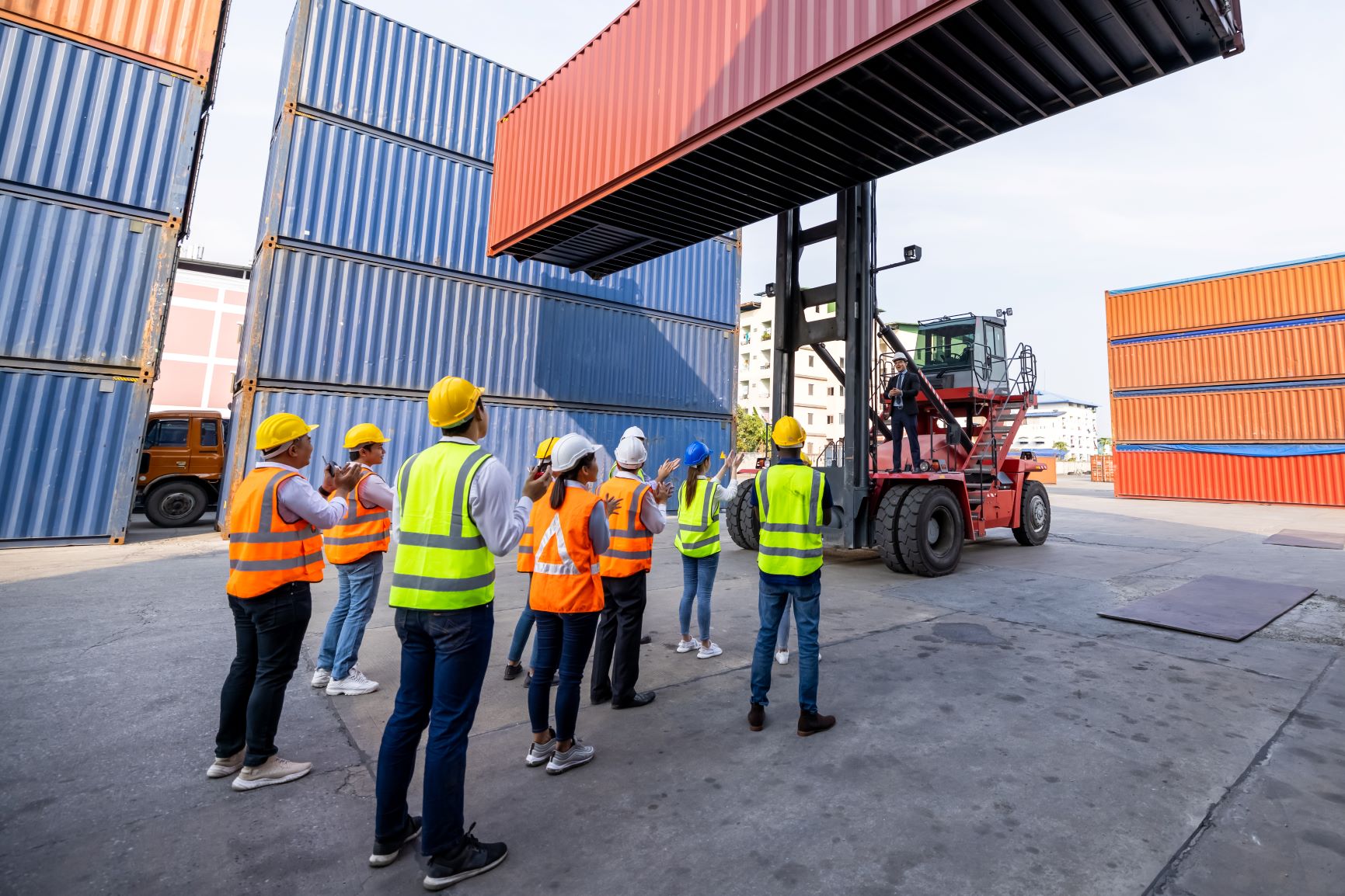 Employees in a warehouse taking part in a training program, demonstrating the importance of upskilling in logistics