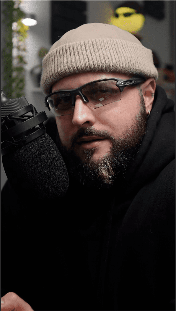 Music producer sitting in his studio