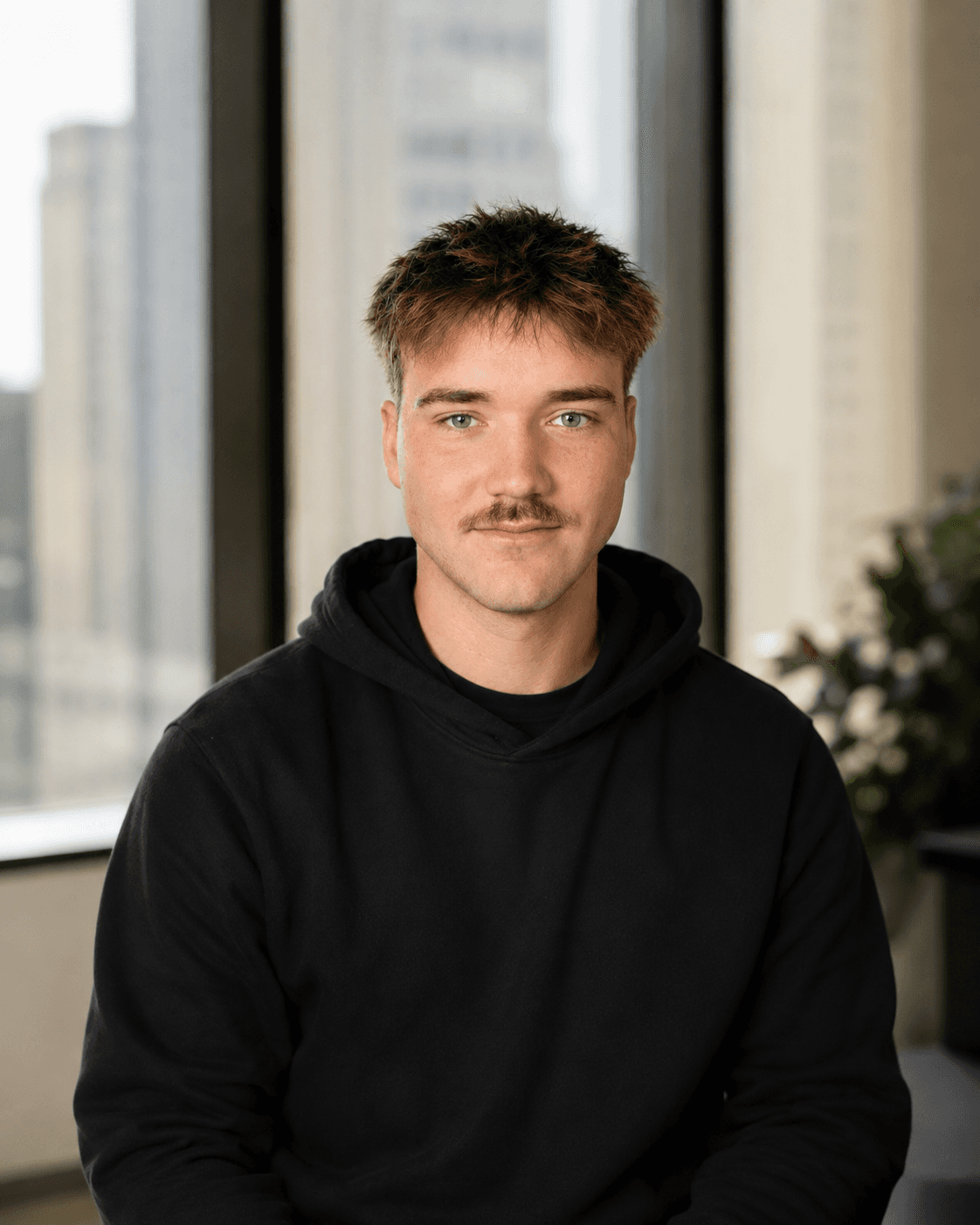 Alony founder in black hoodie