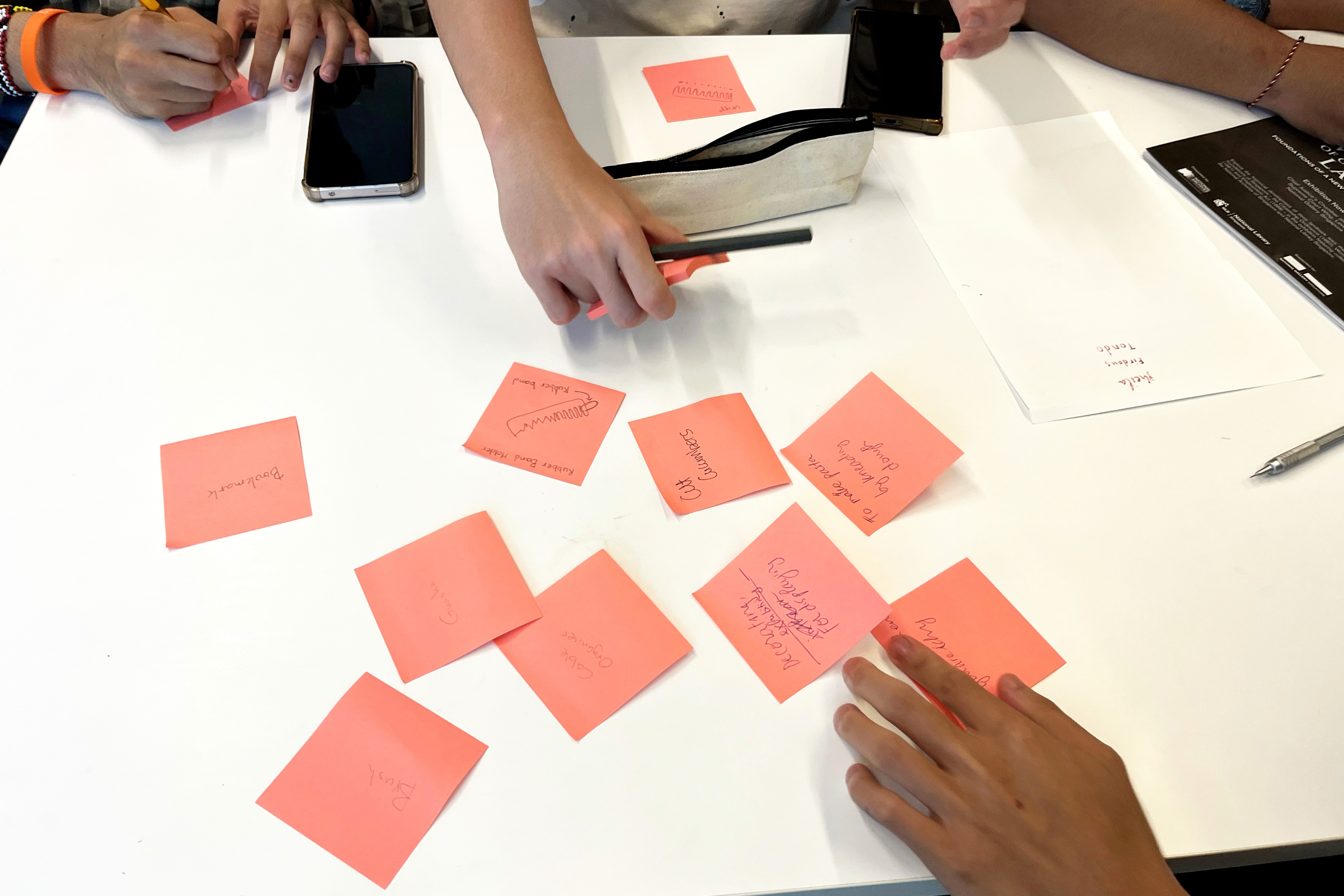 Post-it notes capturing ideas during an ideation session