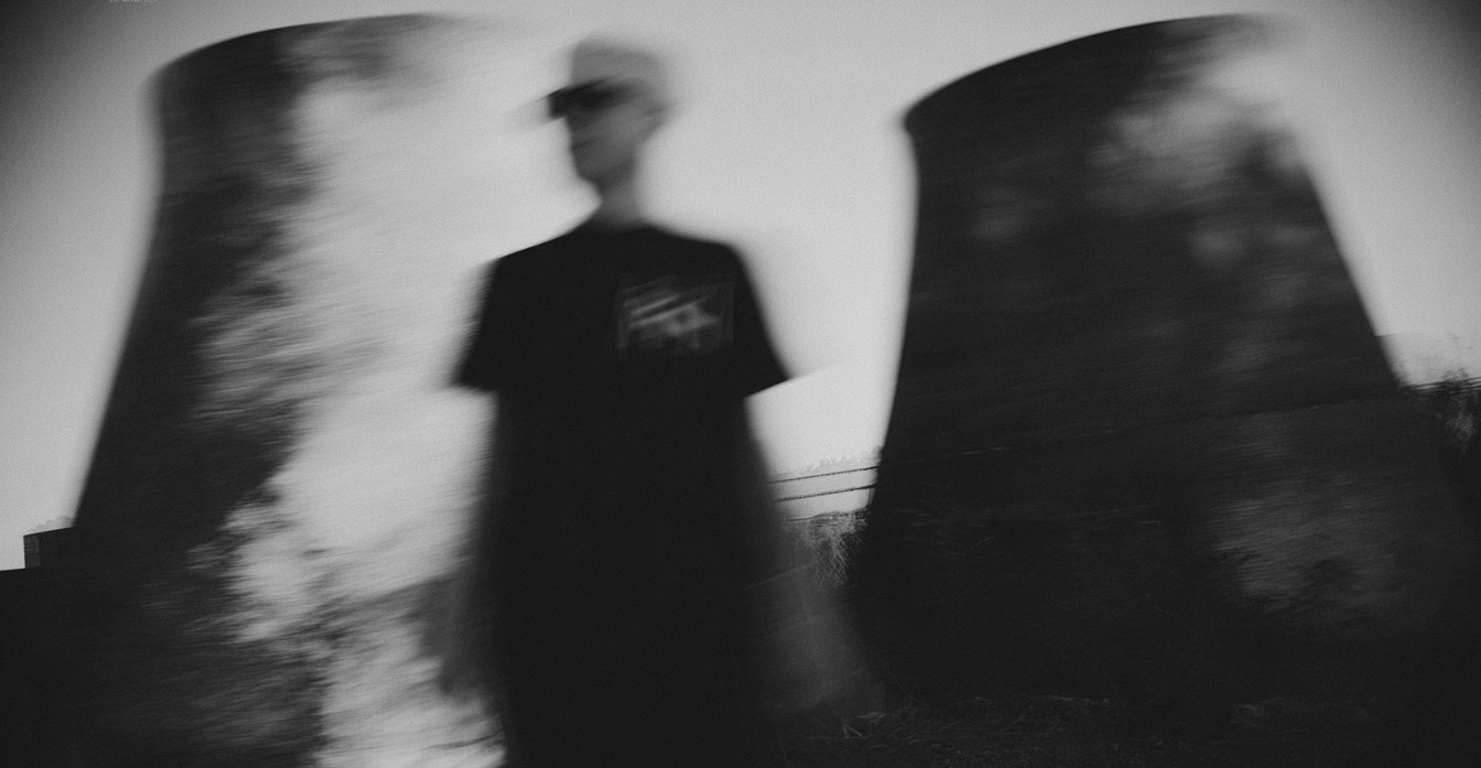 a man holding a cocktail