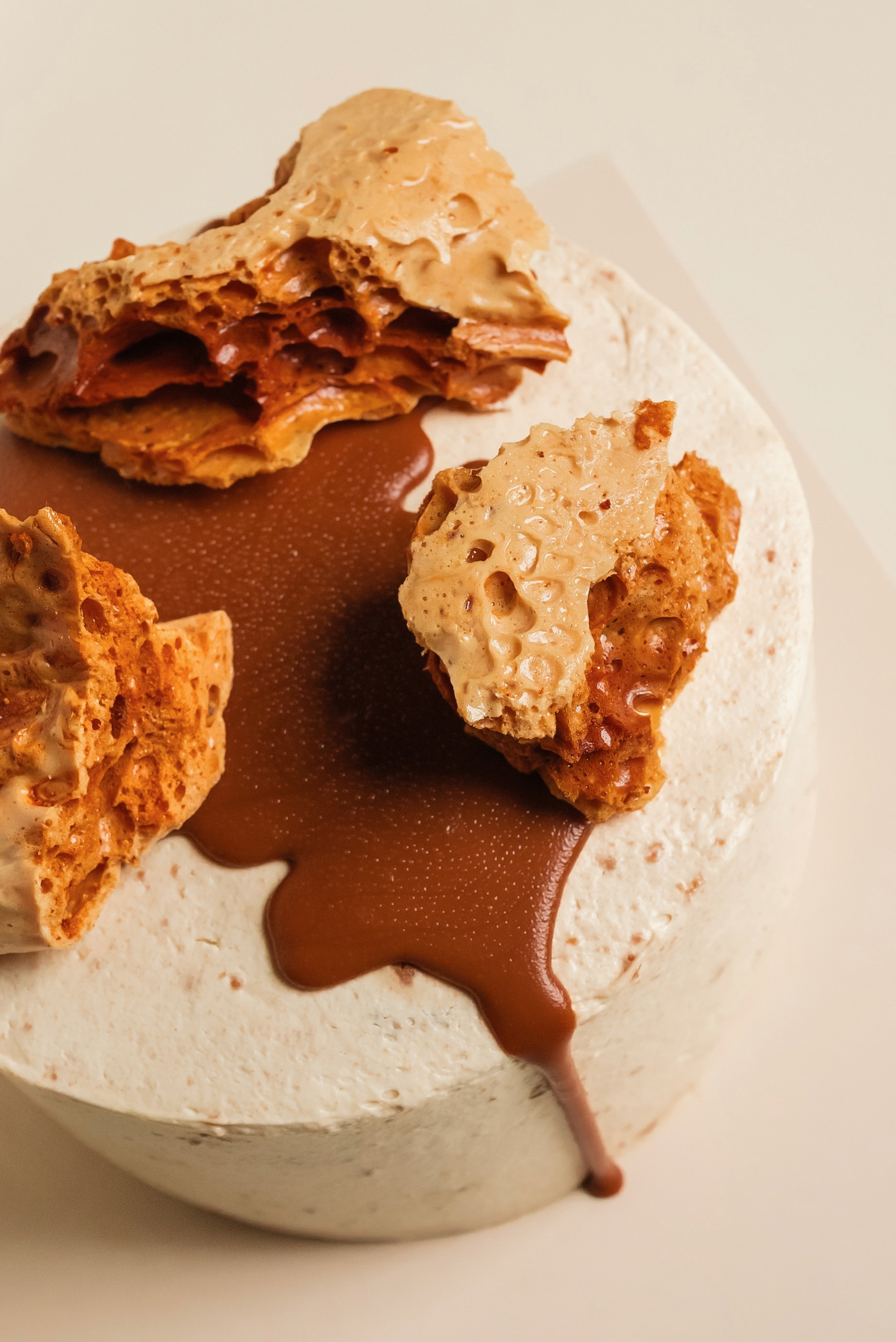 Spilled green smoothie with straw