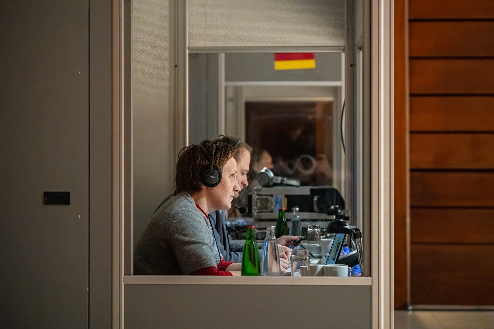 Simultaneous interpreters providing live translation during the CWS Workwear sales conference in Prague.