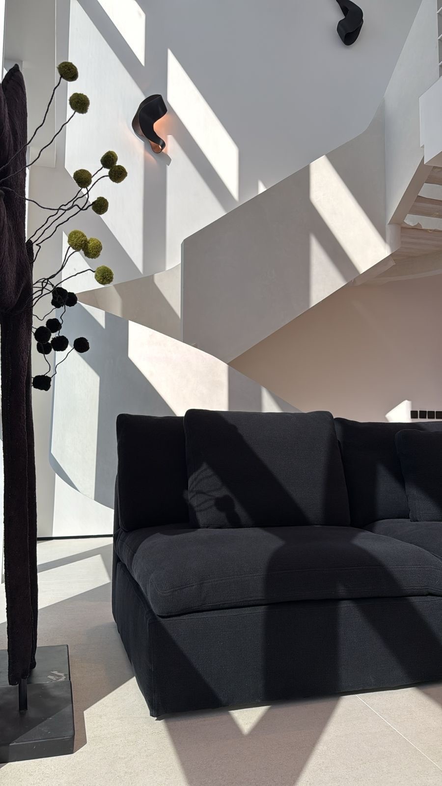 Organic architectural forms with warm wood tones and flowing ceiling structure