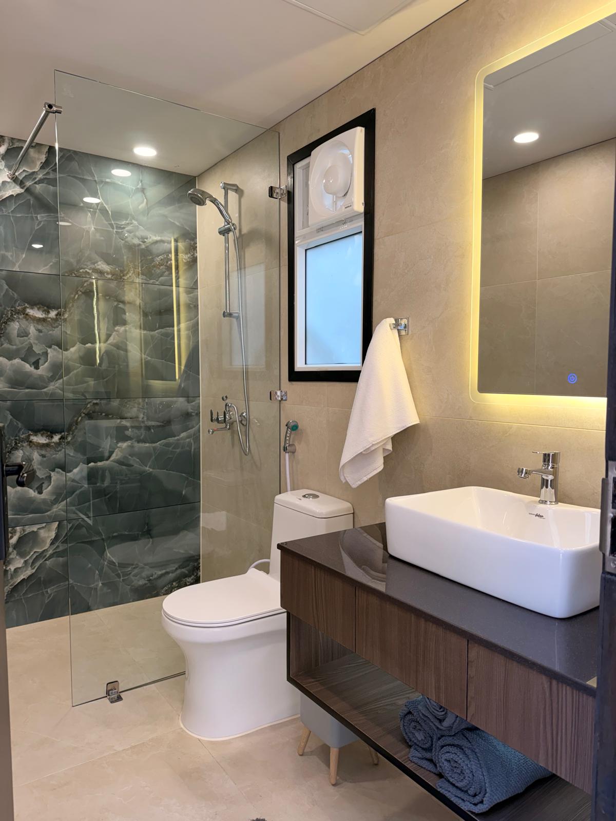 Interior Photo of the VAKIO Pod, showcasing tiling, fixtures, walls, bathroom.