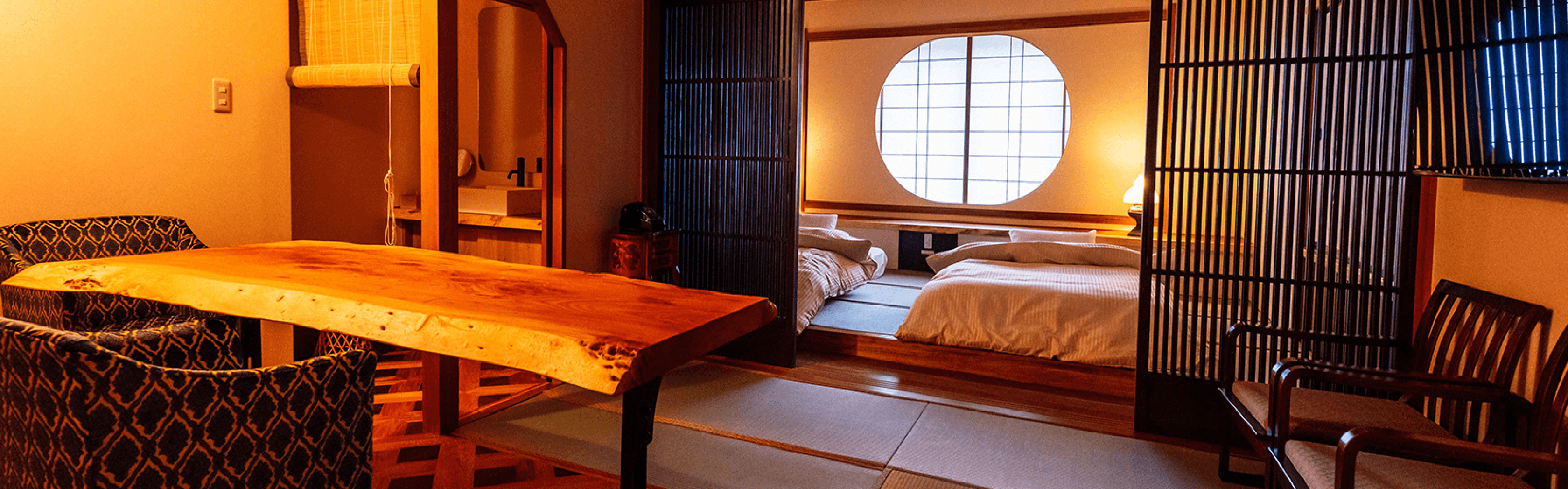A fancy room with a Japanese-styled round window