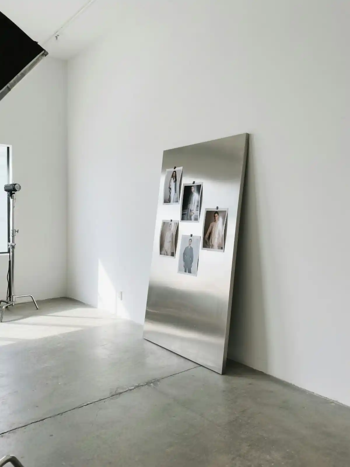 Blue chairs in a neat row against a light gray background, creating a minimalist and modern aesthetic.