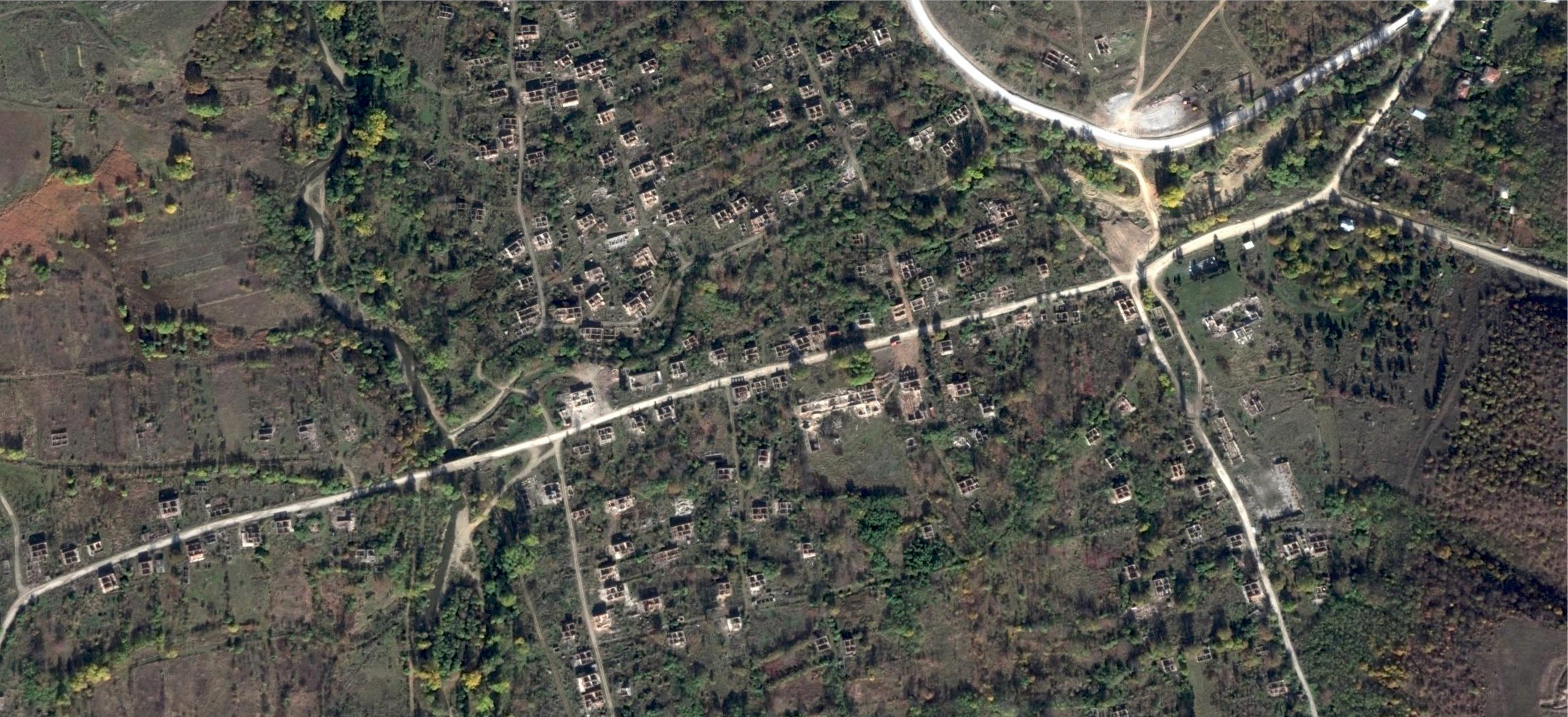 Satellite view of village destruction before and after the occupation, 2007.