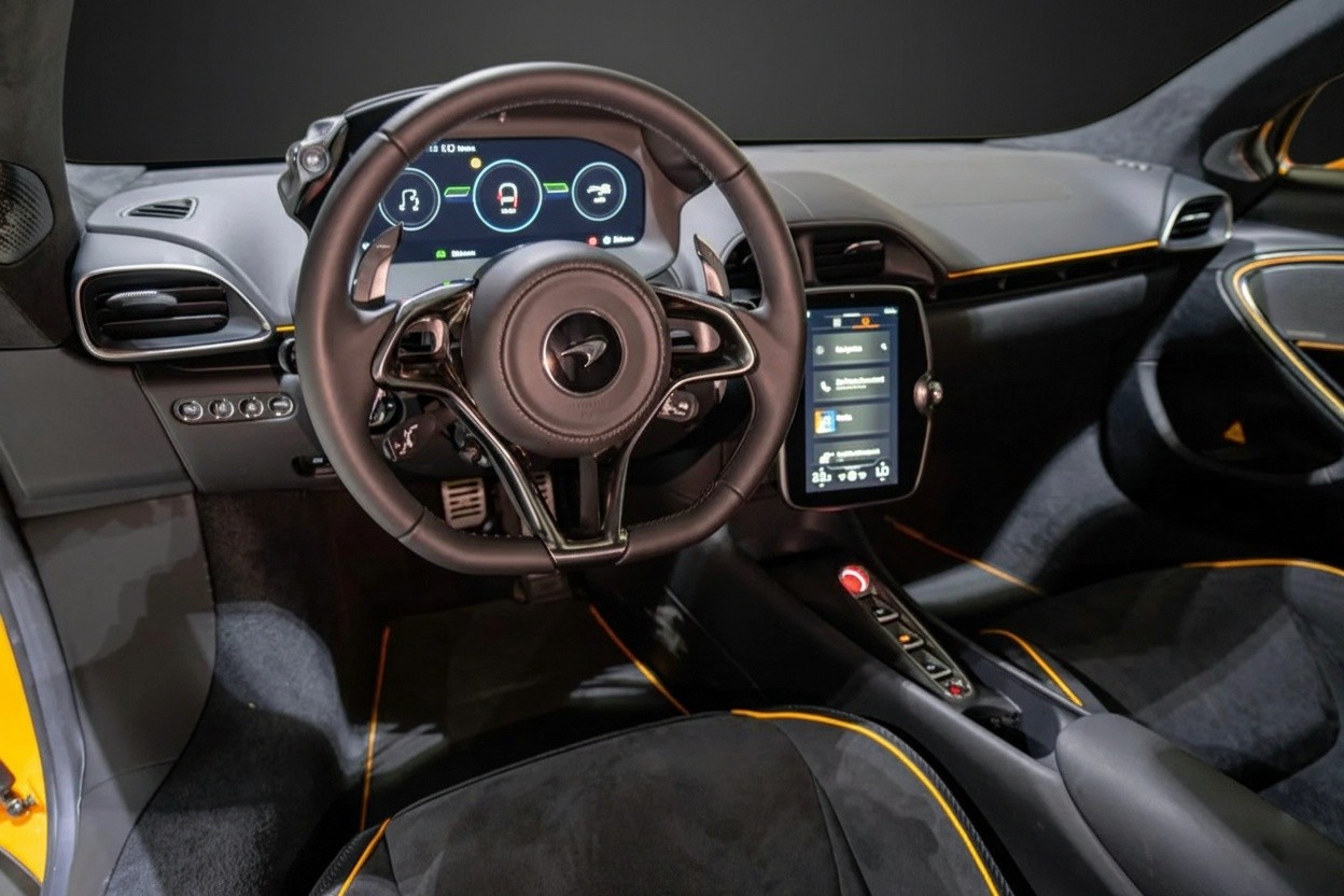 McLaren Artura interior featuring driver focused cockpit and carbon fiber details from Queen of Supercar Rental