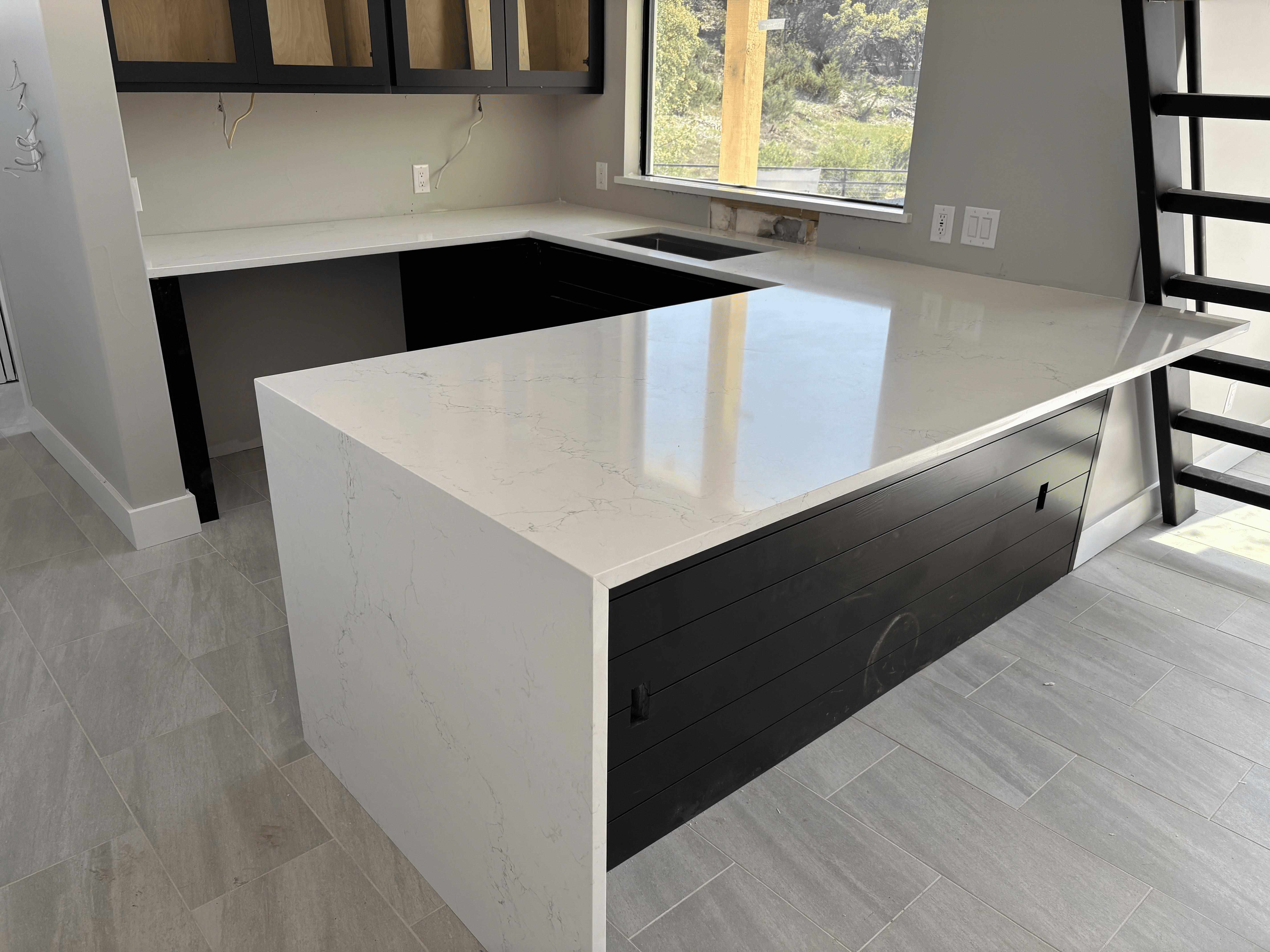 Clean kitchen with wooden flooring