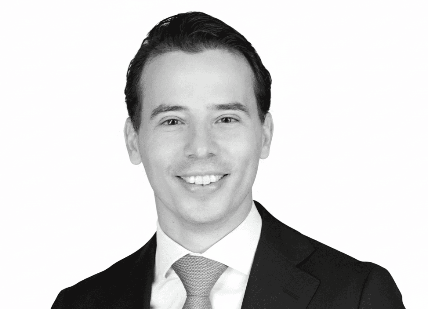 man standing beside wall