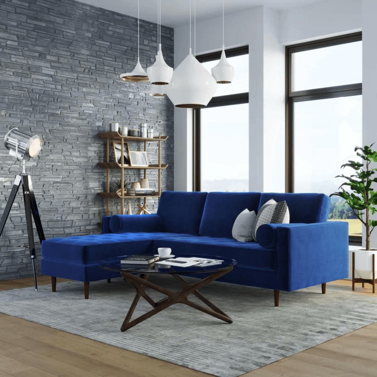 AllModern blue luo wide reversible sofa and Chaise in a modern living room with large windows and wooden decor.