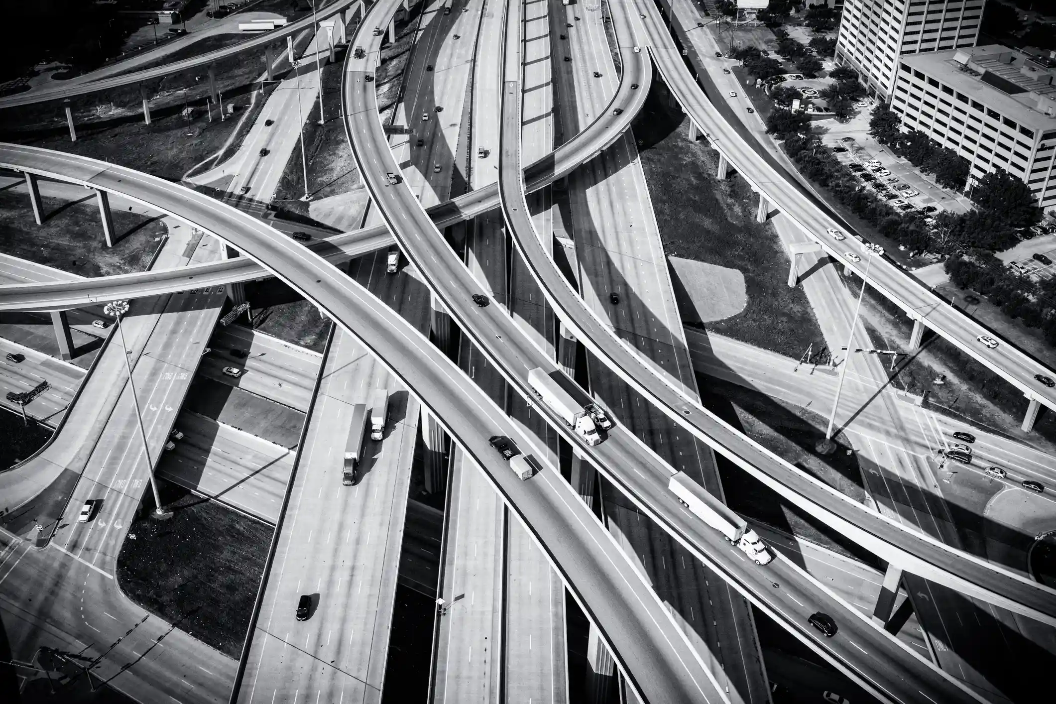 Semi-trucks carrying freight illustrating motor truck cargo coverage by Reliable Transportation Association