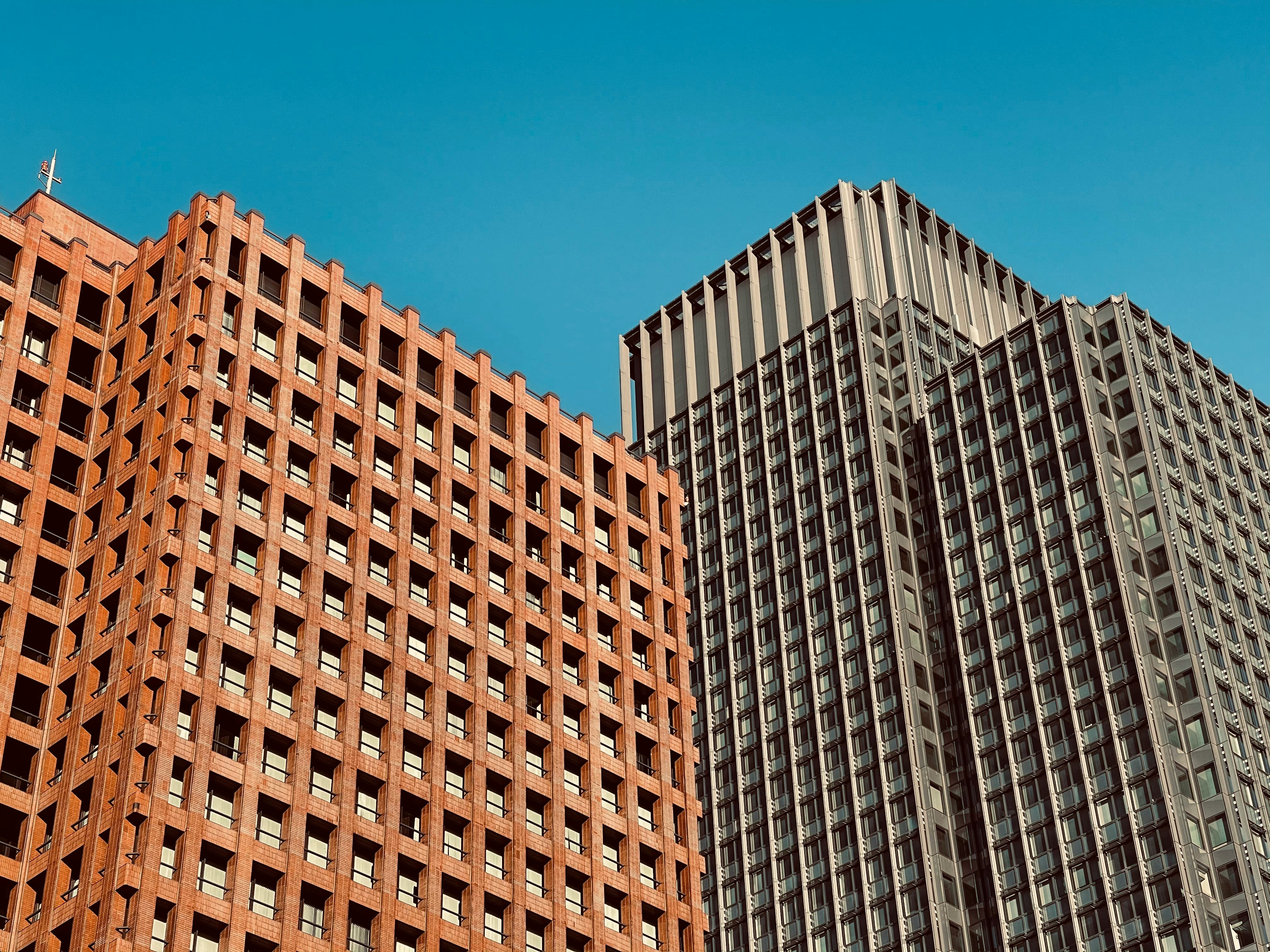 brown concrete building under blue sky during daytime
