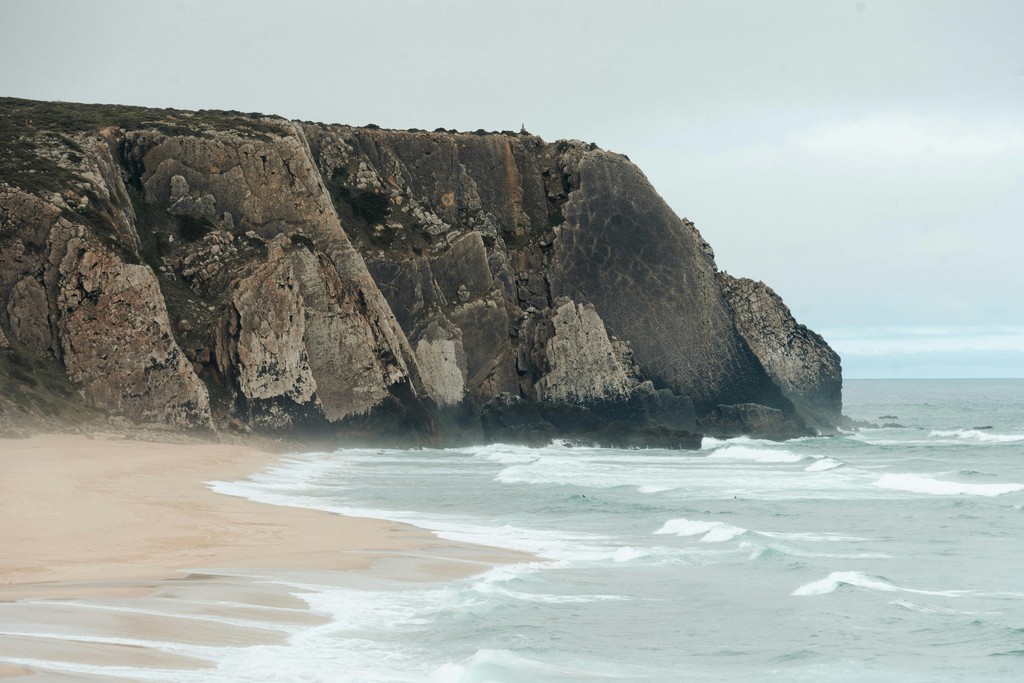 Praia Grande coastline with cliffs and waves