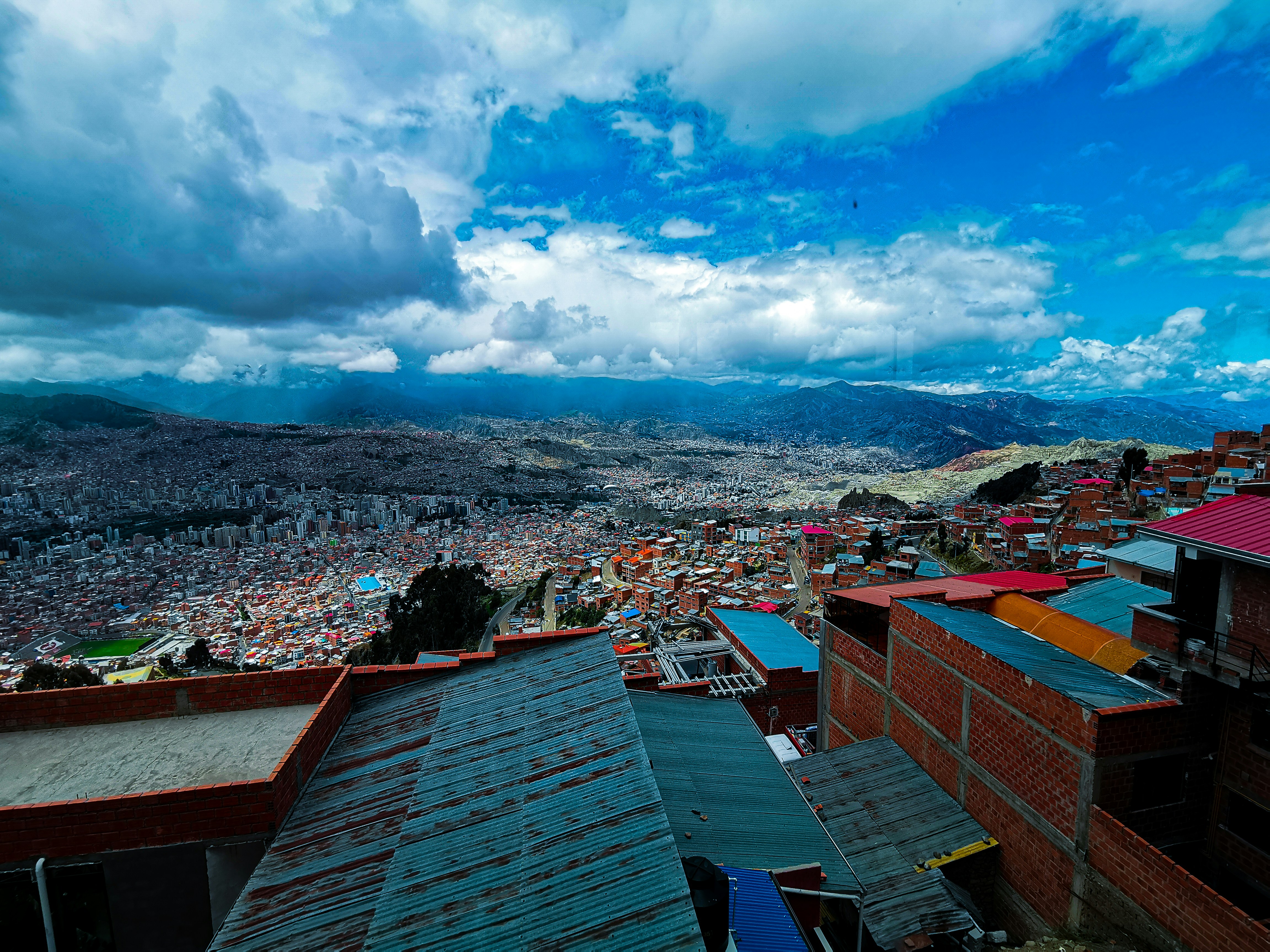 a view of a city from the top of a hill