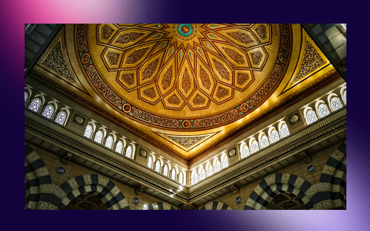 Ornate interior dome of a mosque with intricate Islamic geometric patterns and calligraphy, symbolizing the spiritual grandeur of the Jummah prayer setting.