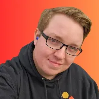 JG Carse headshot in front of orange background