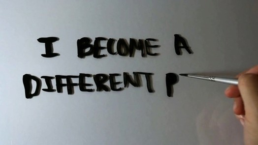 "i become a different person everyday" message written by a person on a reflective surface.