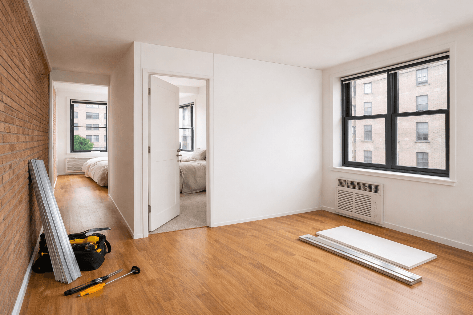 White kitchen fully remodeled with white marble countertop 