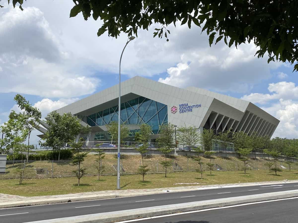 a building with trees and plants