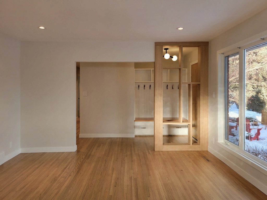 Image of KHD Homes design-build interior with hardwood floors, custom cabinetry, and spacious primary ensuites layout design.