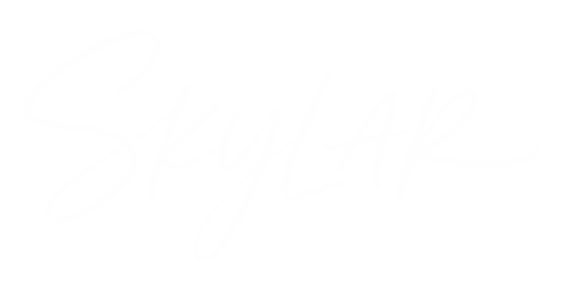 Elegant cursive signature of the name "Skylar" in black.
