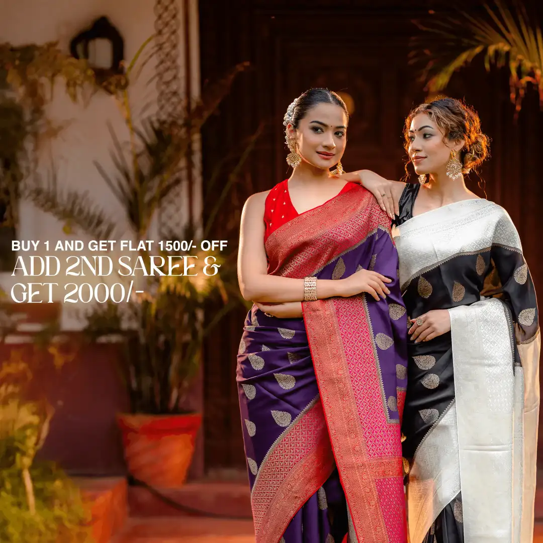 A woman wearing an ivory cream saree, radiating subtle sophistication and refined traditional beauty.