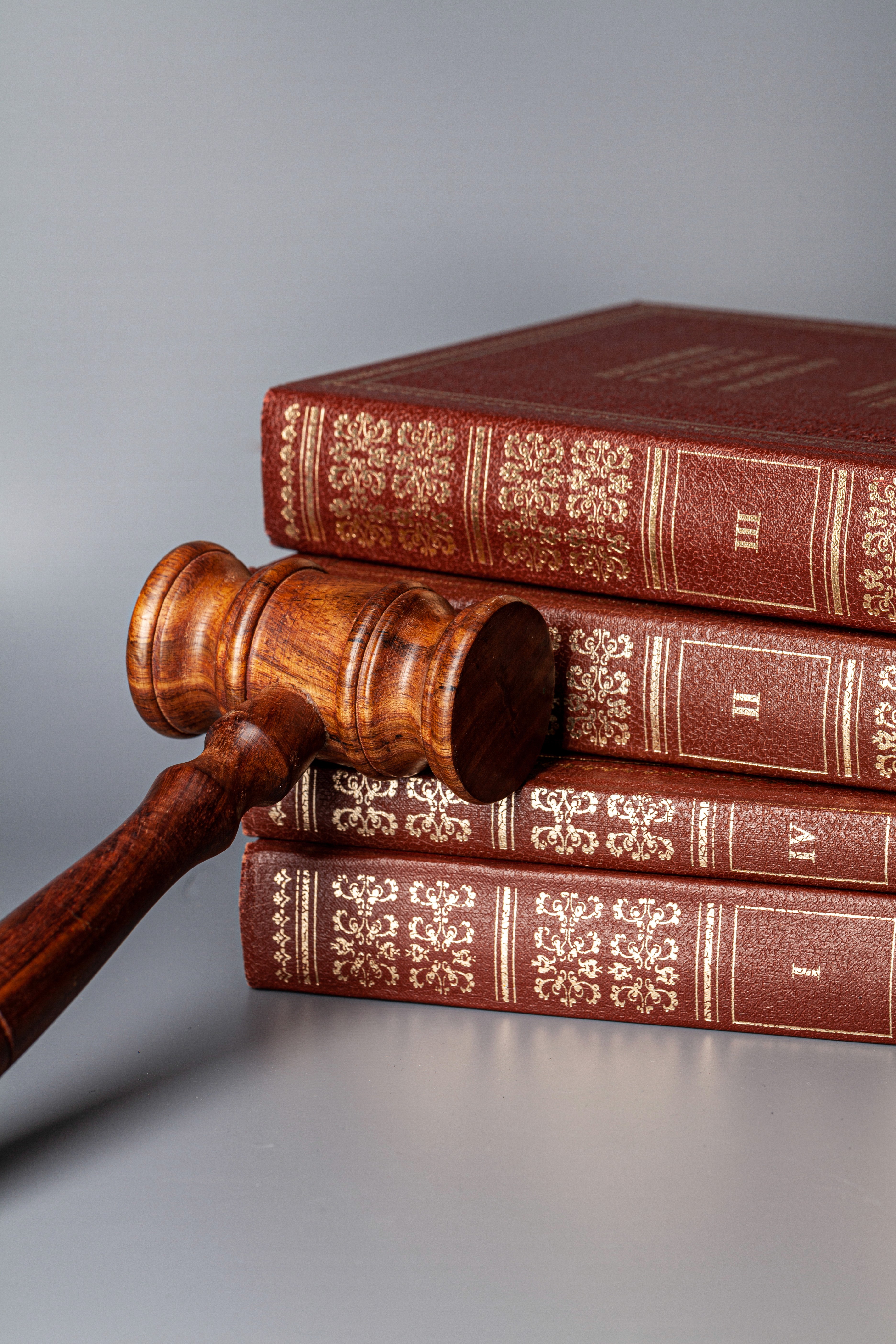 Bachelor of Arts and Bachelor of Legislative Law (BA LL.B) symbolized by legal books and a judge’s gavel representing arts education combined with legal studies.
