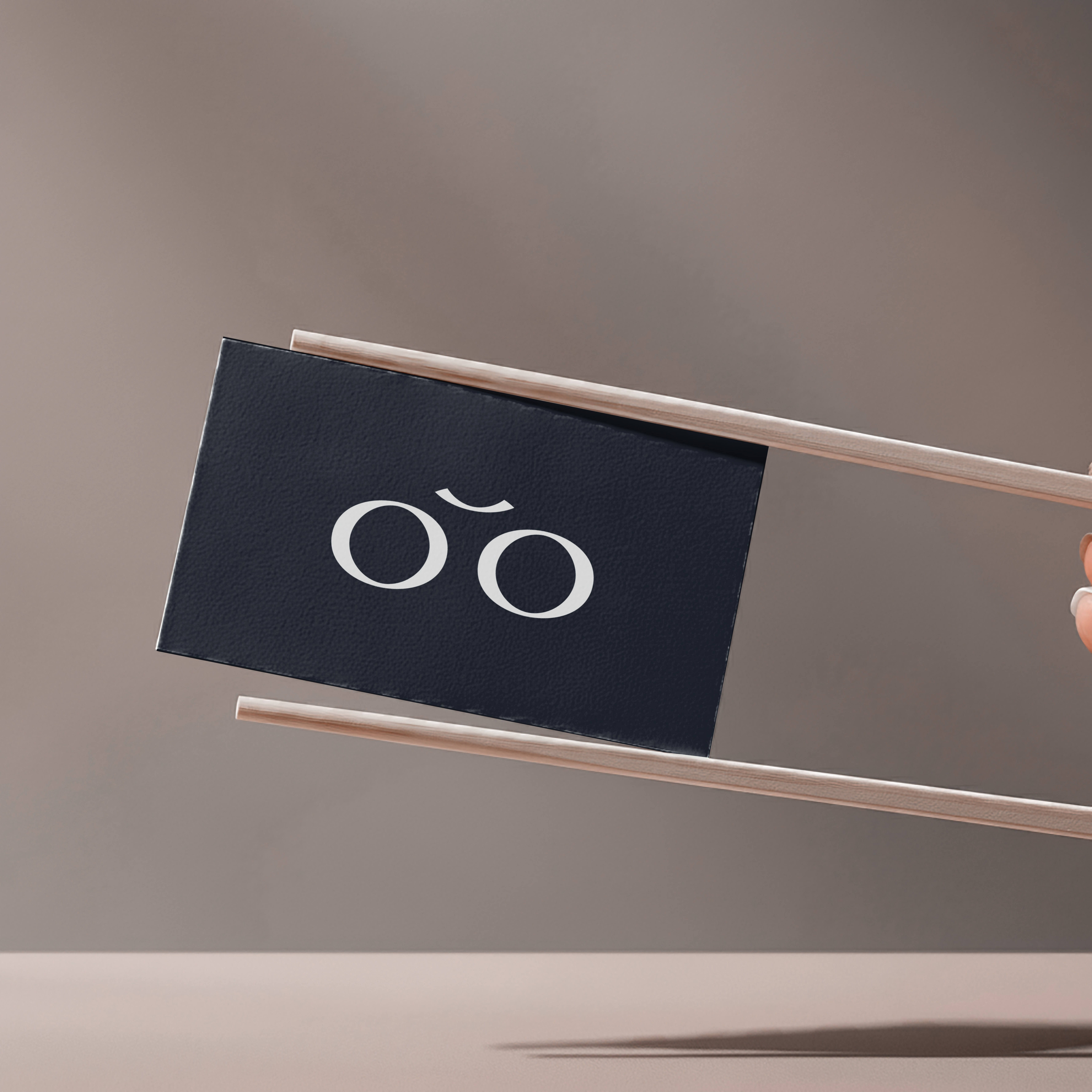 a person holding a cell phone in their hand