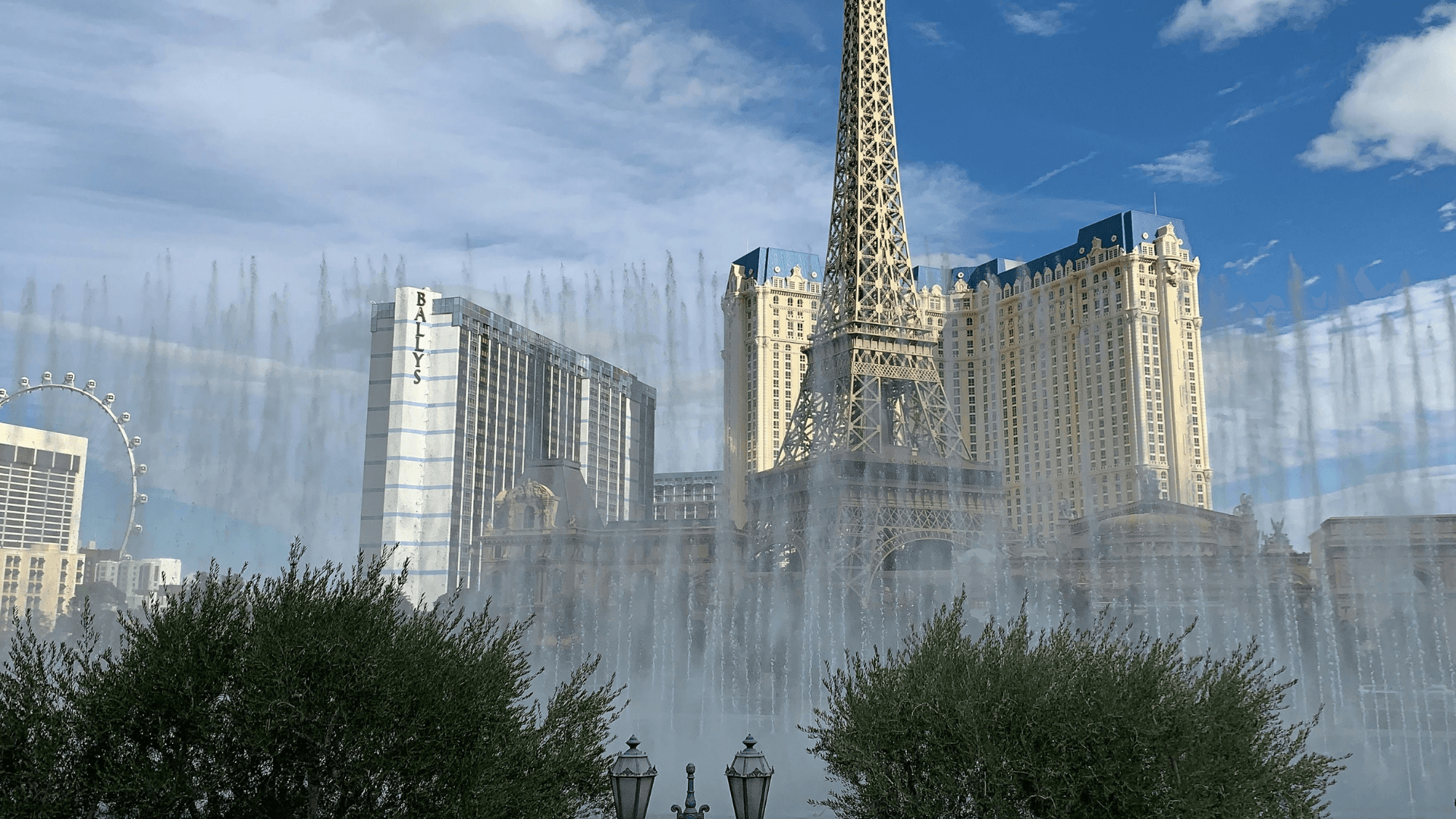 The eiffel tower in fron of high-rish high-profile resorts