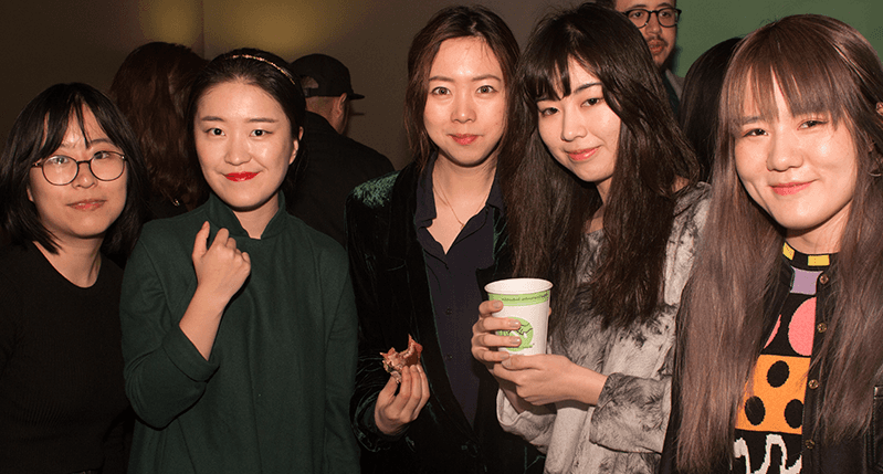 a group photo of five women