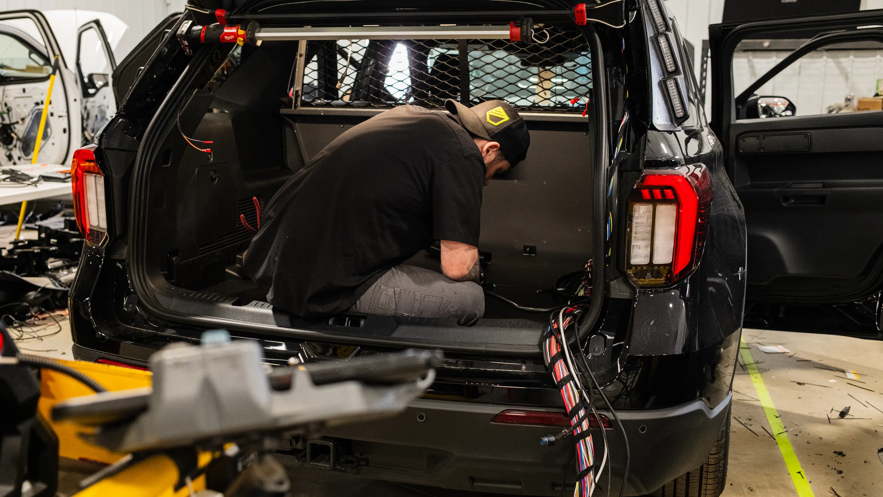 Comparison of in-house police vehicle upfitting and working with a specialized public safety vehicle upfitter