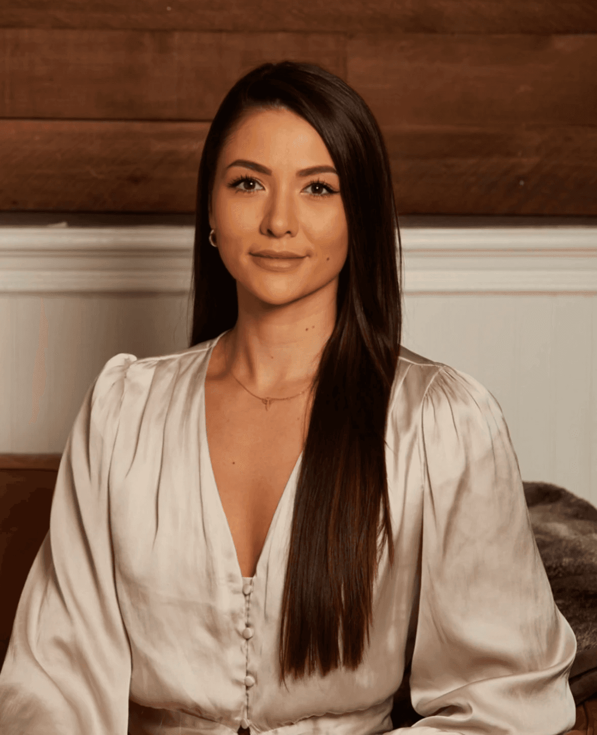 woman in black blazer standing