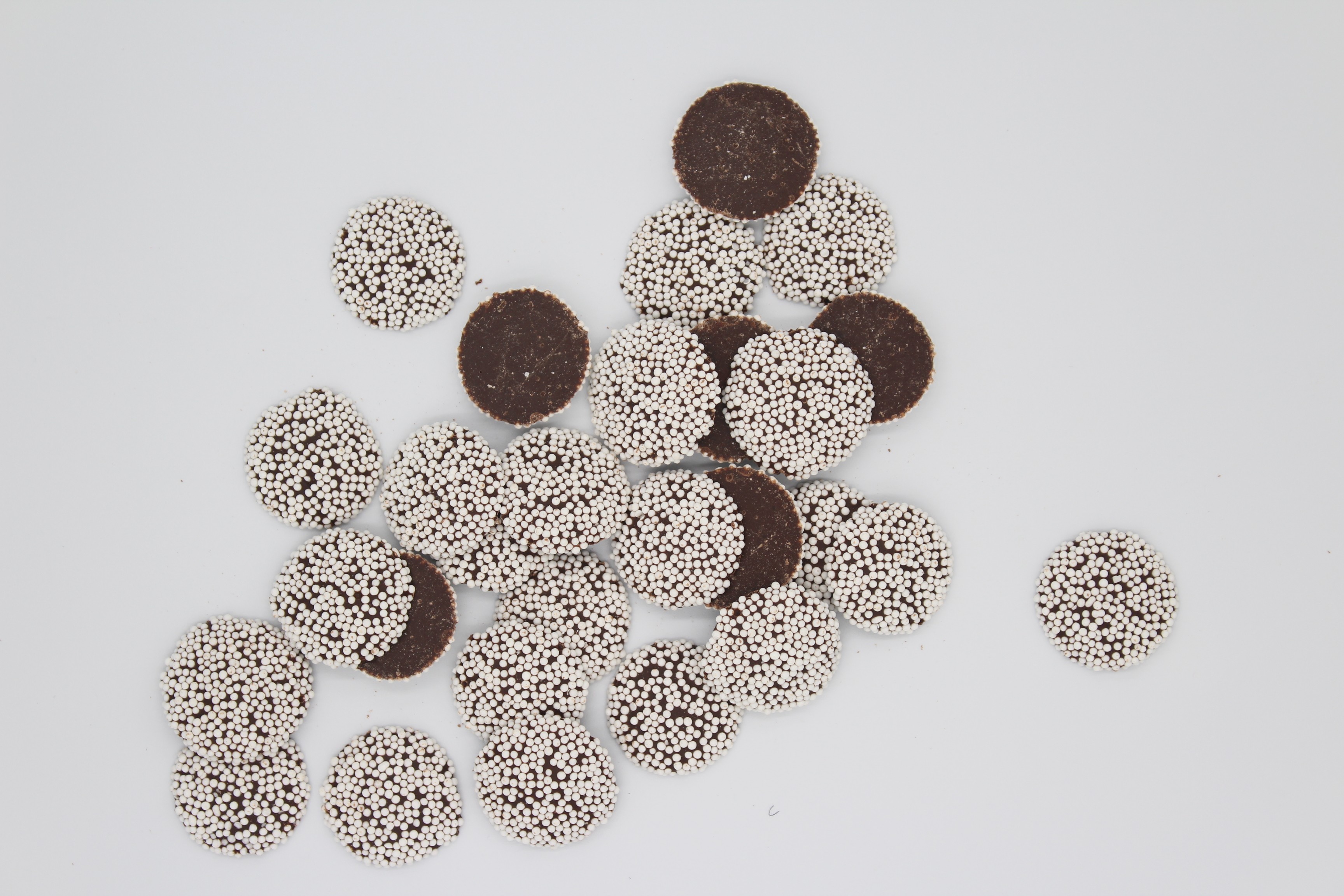 Chocolate pieces in bulk container