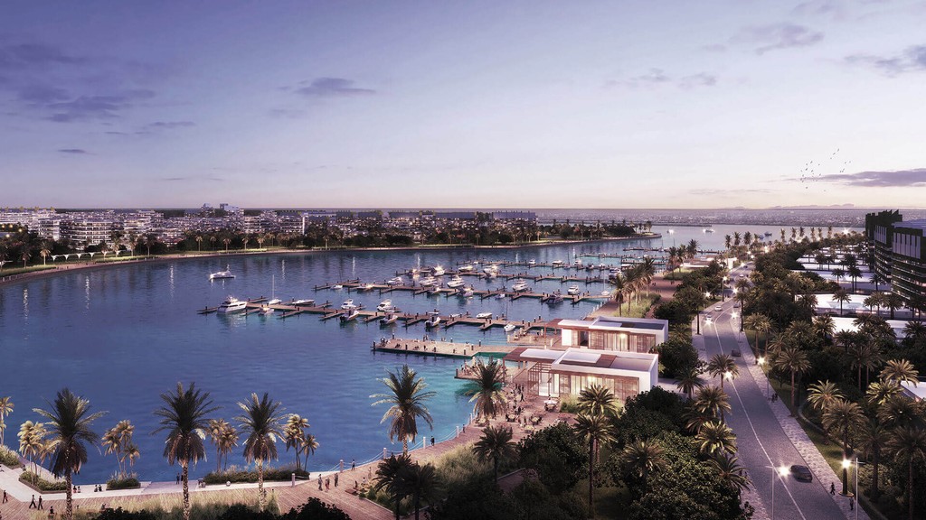 Luxurious beachfront properties on Dubai Islands, surrounded by turquoise waters and lush greenery, reflecting opulence.