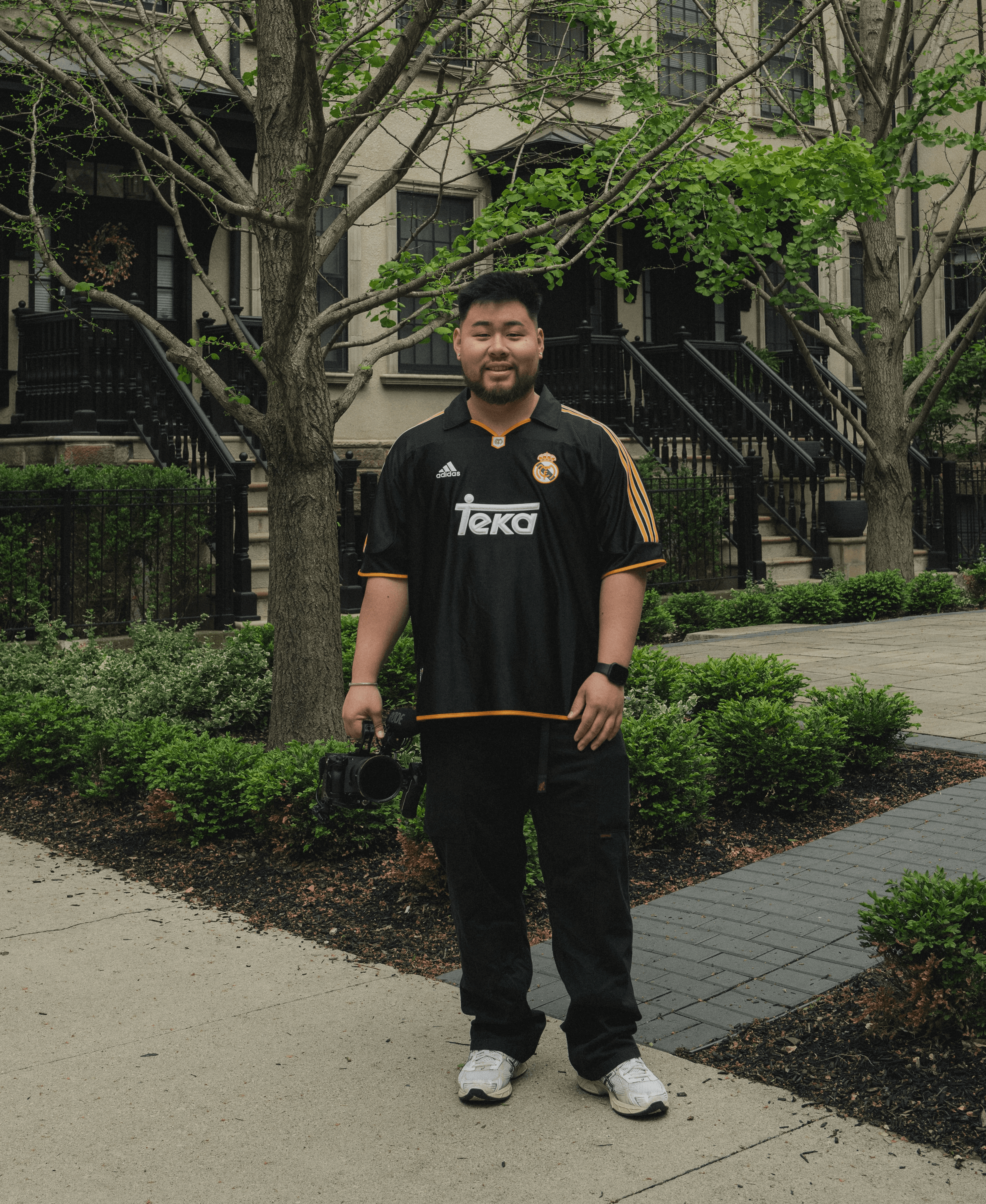 a blurry photo of a person standing in front of a wall