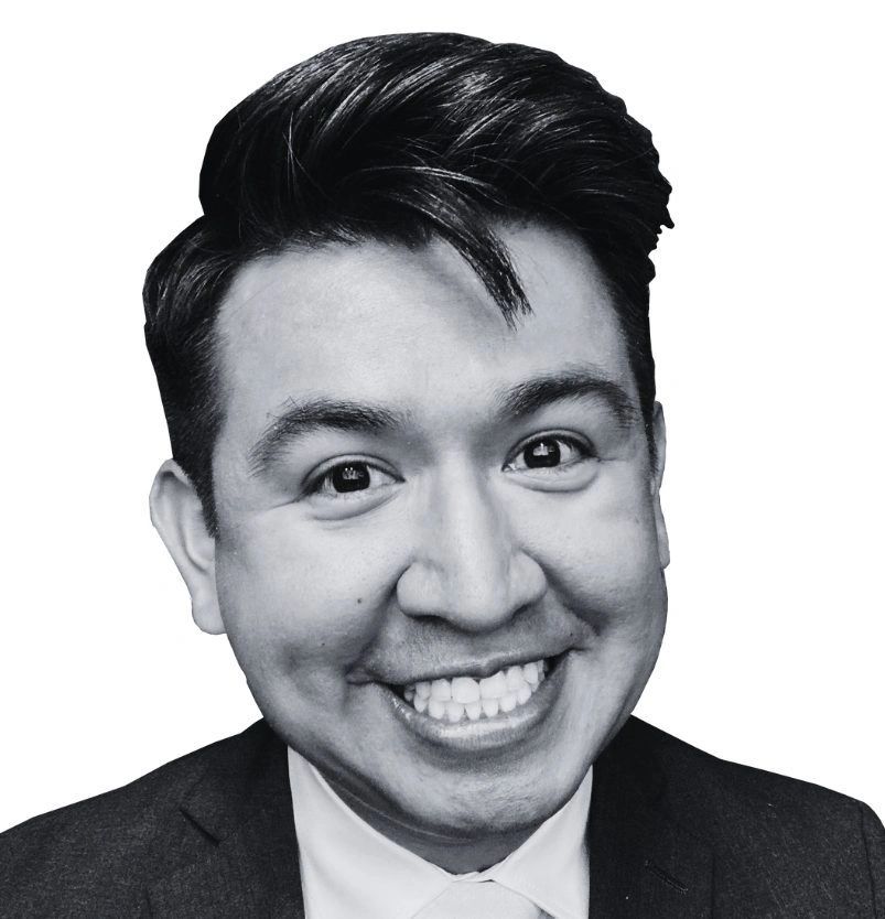 a black and white living room with a large tv