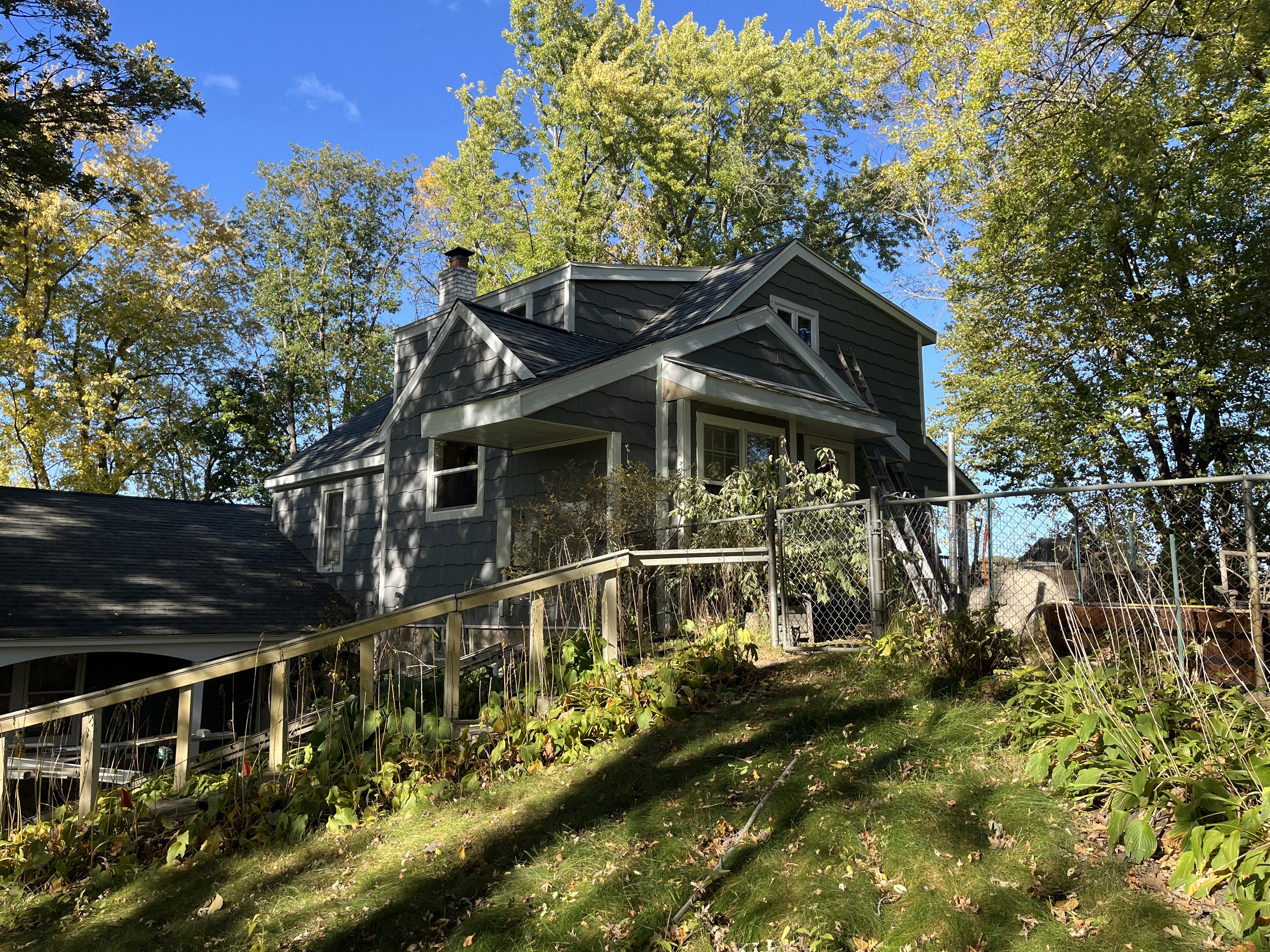 Back of house with dover gray lp shakes