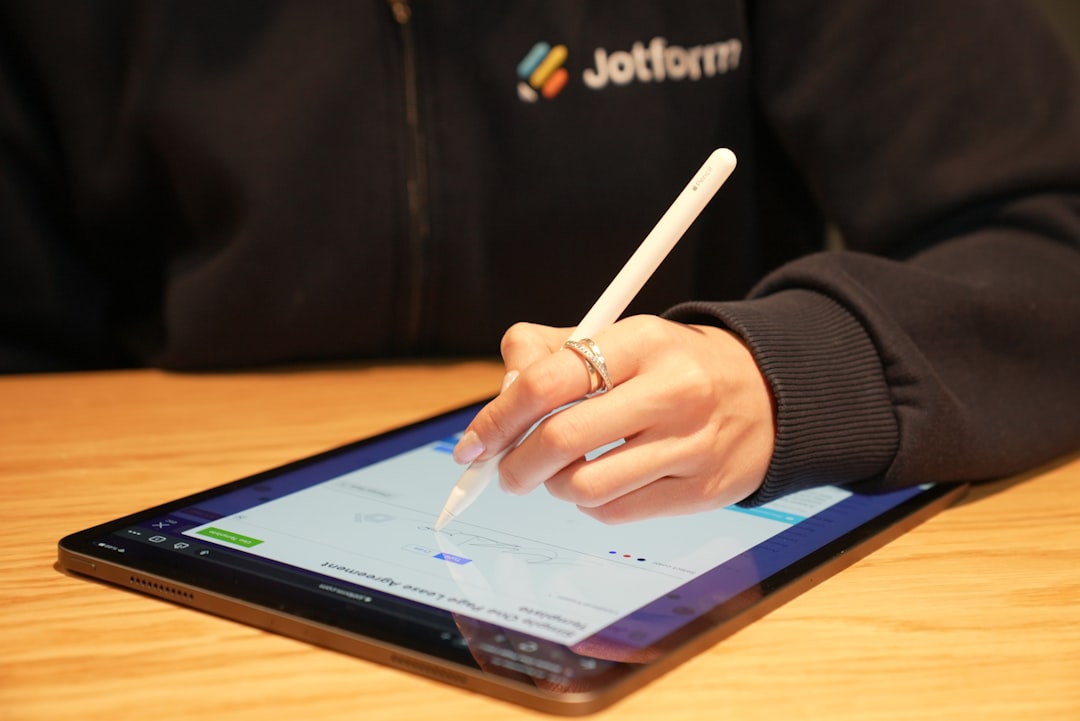 digital tablet displaying a complex healthcare roster map, a manager's hand pointing at a glowing notification icon, office background with medical equipment and files