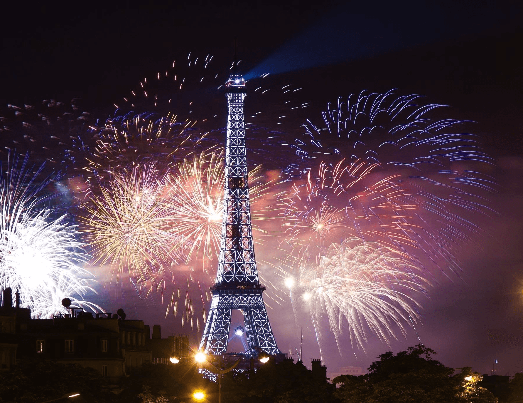 a view of a city with a large body of water in the background